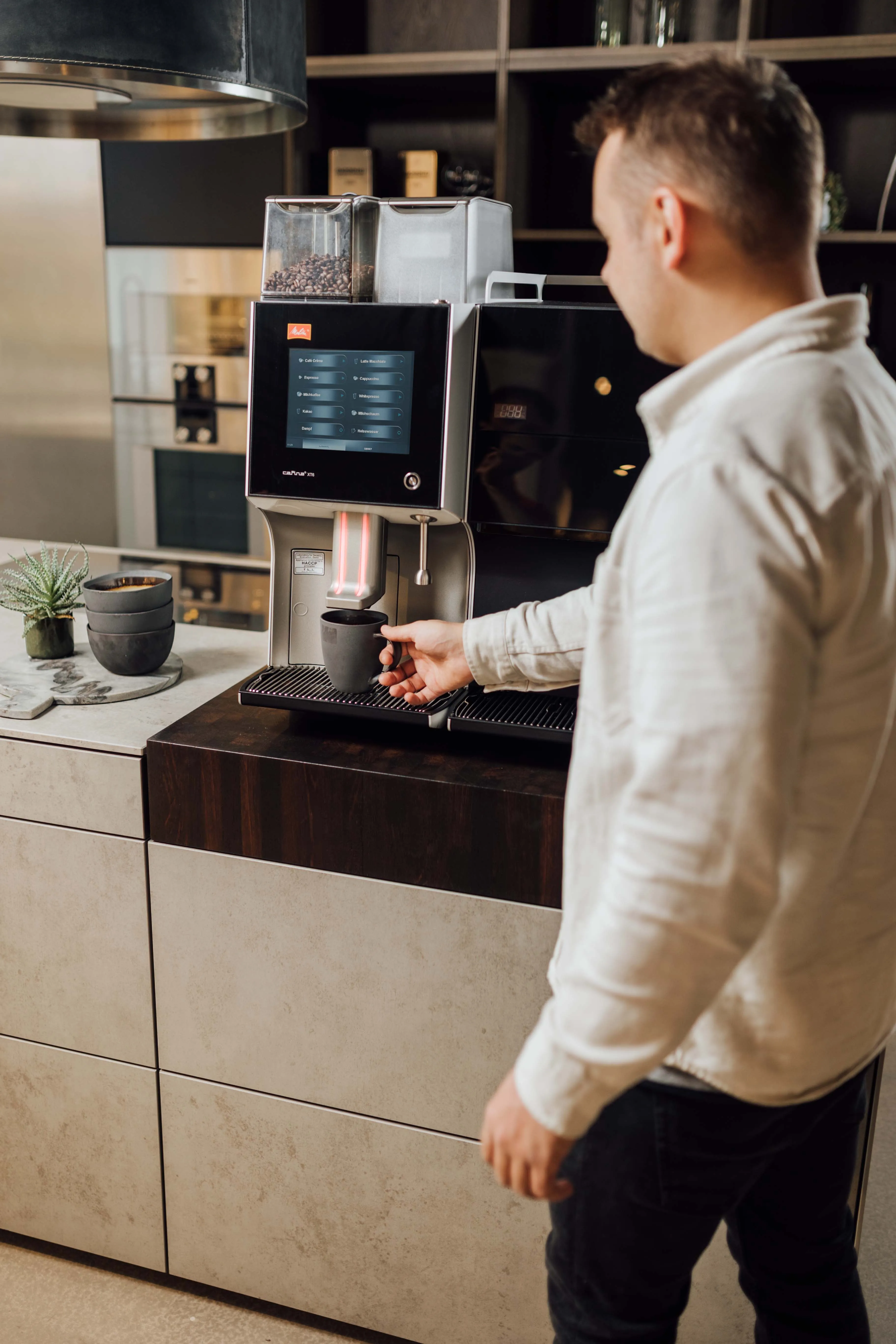Mennesker som drikker kaffe - Kaffeknappen